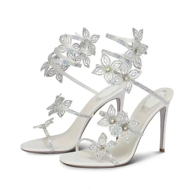 Strass di lusso Fiori Sandali gladiatore da donna Sexy Spago serpente Cinturino alla caviglia Tacchi alti Scarpe da ballo estive da sposa Sandali