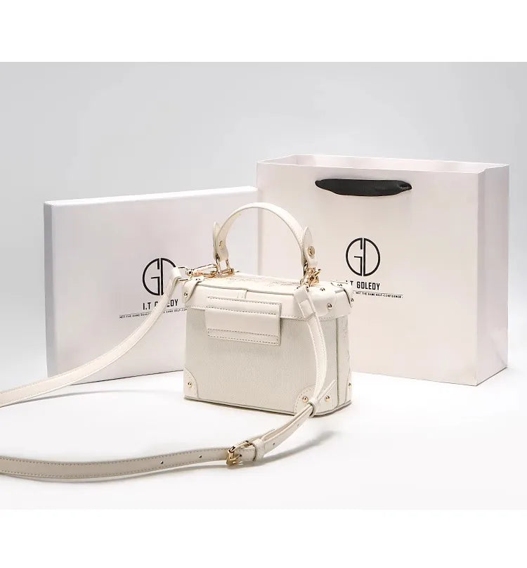 Mostra borsa elegante 2025 con motivo floreale in rilievo ideale per le feste serali da donna, anche una pratica tracolla per l'uso quotidiano