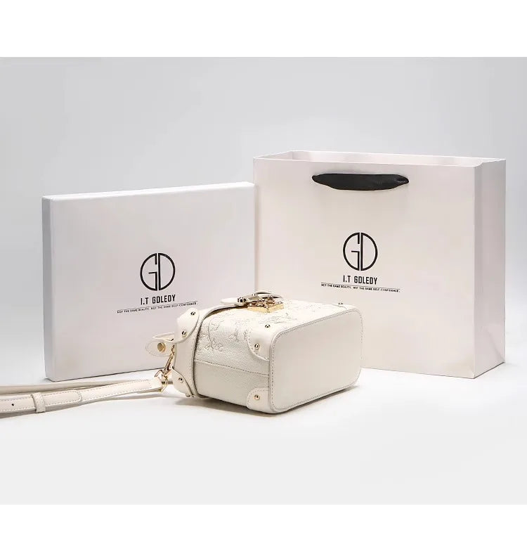Mostra borsa elegante 2025 con motivo floreale in rilievo ideale per le feste serali da donna, anche una pratica tracolla per l'uso quotidiano