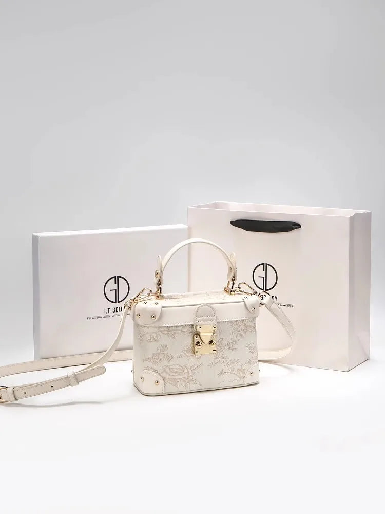 Mostra borsa elegante 2025 con motivo floreale in rilievo ideale per le feste serali da donna, anche una pratica tracolla per l'uso quotidiano