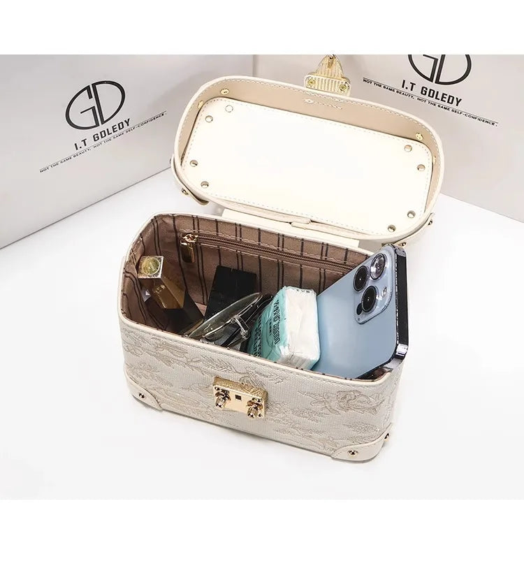 Mostra borsa elegante 2025 con motivo floreale in rilievo ideale per le feste serali da donna, anche una pratica tracolla per l'uso quotidiano