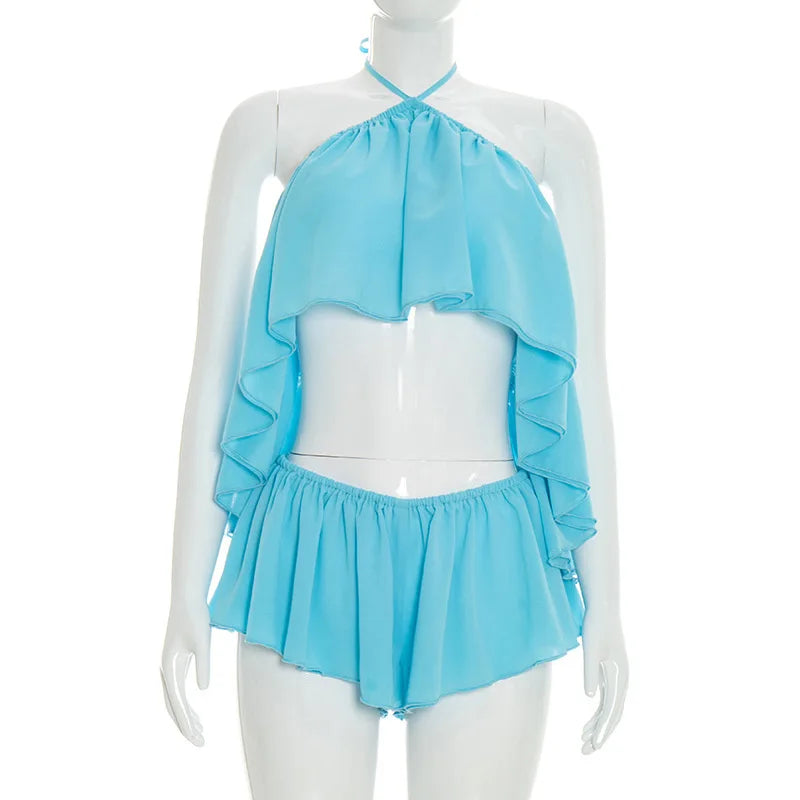 Completo due pezzi Chaxiaoa da donna, estivo 2026, sexy, con top halter senza schienale e minigonna pantaloncino, per feste e serate in discoteca