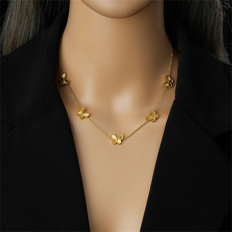 DIEYURO Acciaio inossidabile 316L dorato elegante conchiglia bianca serie farfalla set collana orecchini braccialetto gioielli di tendenza regalo