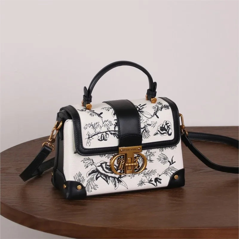 Borsa a tracolla da donna alla moda e di lusso leggero, novità autunno inverno 2026, con ricamo retrò e texture di alta qualità.