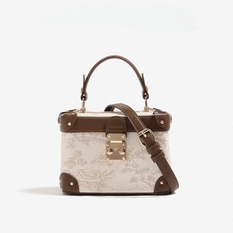Mostra borsa elegante 2025 con motivo floreale in rilievo ideale per le feste serali da donna, anche una pratica tracolla per l'uso quotidiano