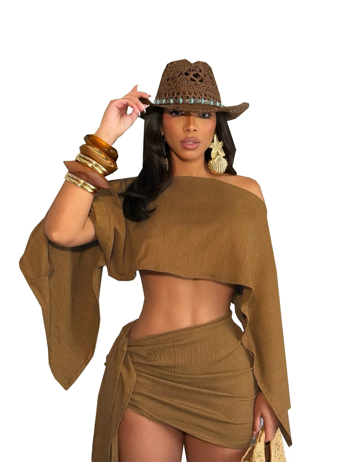 Completo estivo da donna per vacanze al mare: top traspirante con scollo laterale e spalle scoperte e gonna corta avvolgente a metà coscia