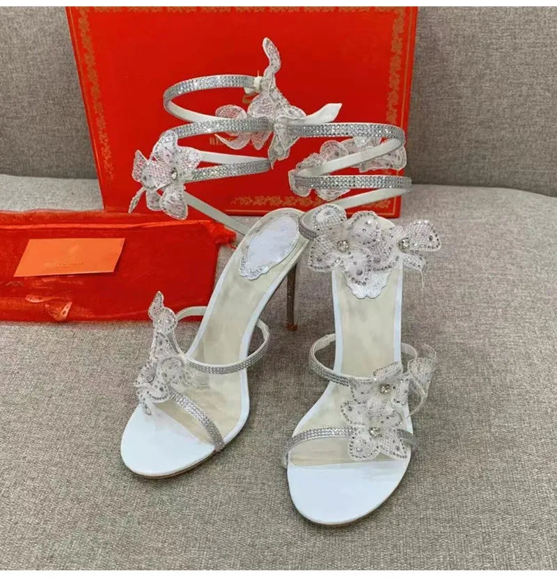 Strass di lusso Fiori Sandali gladiatore da donna Sexy Spago serpente Cinturino alla caviglia Tacchi alti Scarpe da ballo estive da sposa Sandali