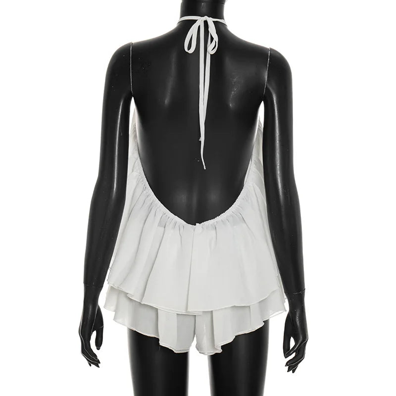 Completo due pezzi Chaxiaoa da donna, estivo 2026, sexy, con top halter senza schienale e minigonna pantaloncino, per feste e serate in discoteca