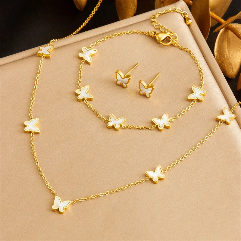 DIEYURO Acciaio inossidabile 316L dorato elegante conchiglia bianca serie farfalla set collana orecchini braccialetto gioielli di tendenza regalo
