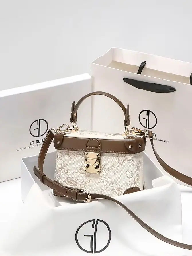 Mostra borsa elegante 2025 con motivo floreale in rilievo ideale per le feste serali da donna, anche una pratica tracolla per l'uso quotidiano