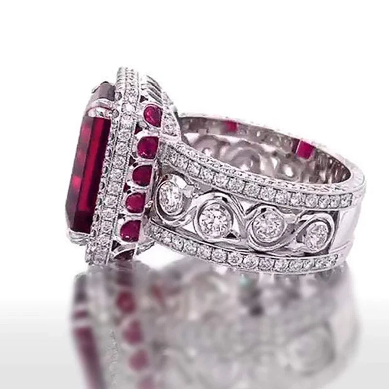 Anello Huitan di Lusso con Zirconi Rossi Scintillanti per Donne, Accessorio Elegante per Matrimoni, Design Inciso, Gioiello Femminile Delicato per Feste