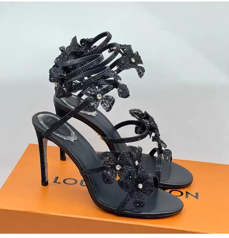 Strass di lusso Fiori Sandali gladiatore da donna Sexy Spago serpente Cinturino alla caviglia Tacchi alti Scarpe da ballo estive da sposa Sandali