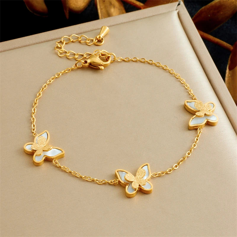 DIEYURO Acciaio inossidabile 316L dorato elegante conchiglia bianca serie farfalla set collana orecchini braccialetto gioielli di tendenza regalo