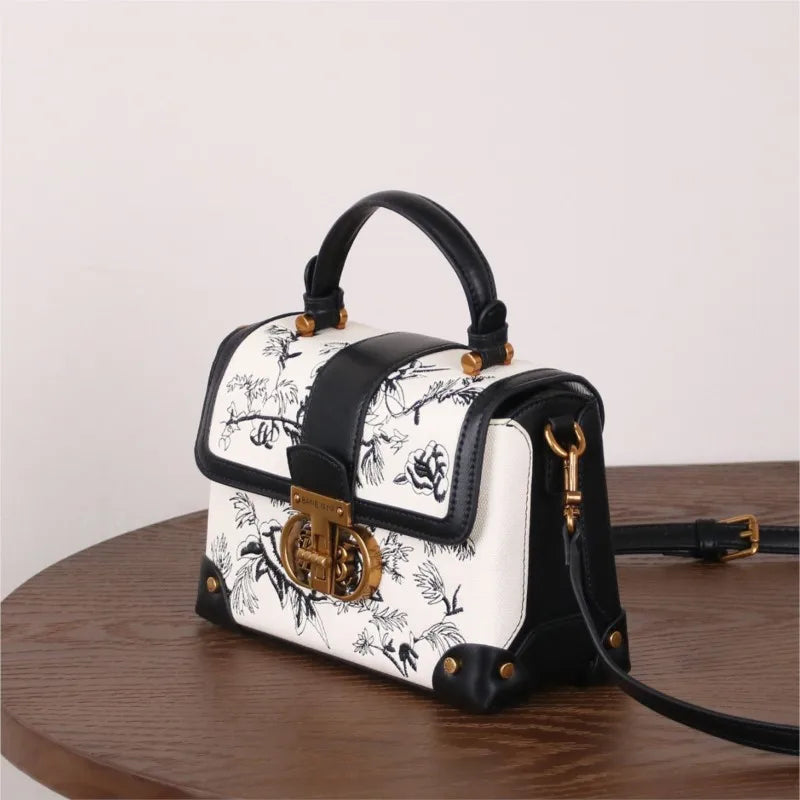 Borsa a tracolla da donna alla moda e di lusso leggero, novità autunno inverno 2026, con ricamo retrò e texture di alta qualità.