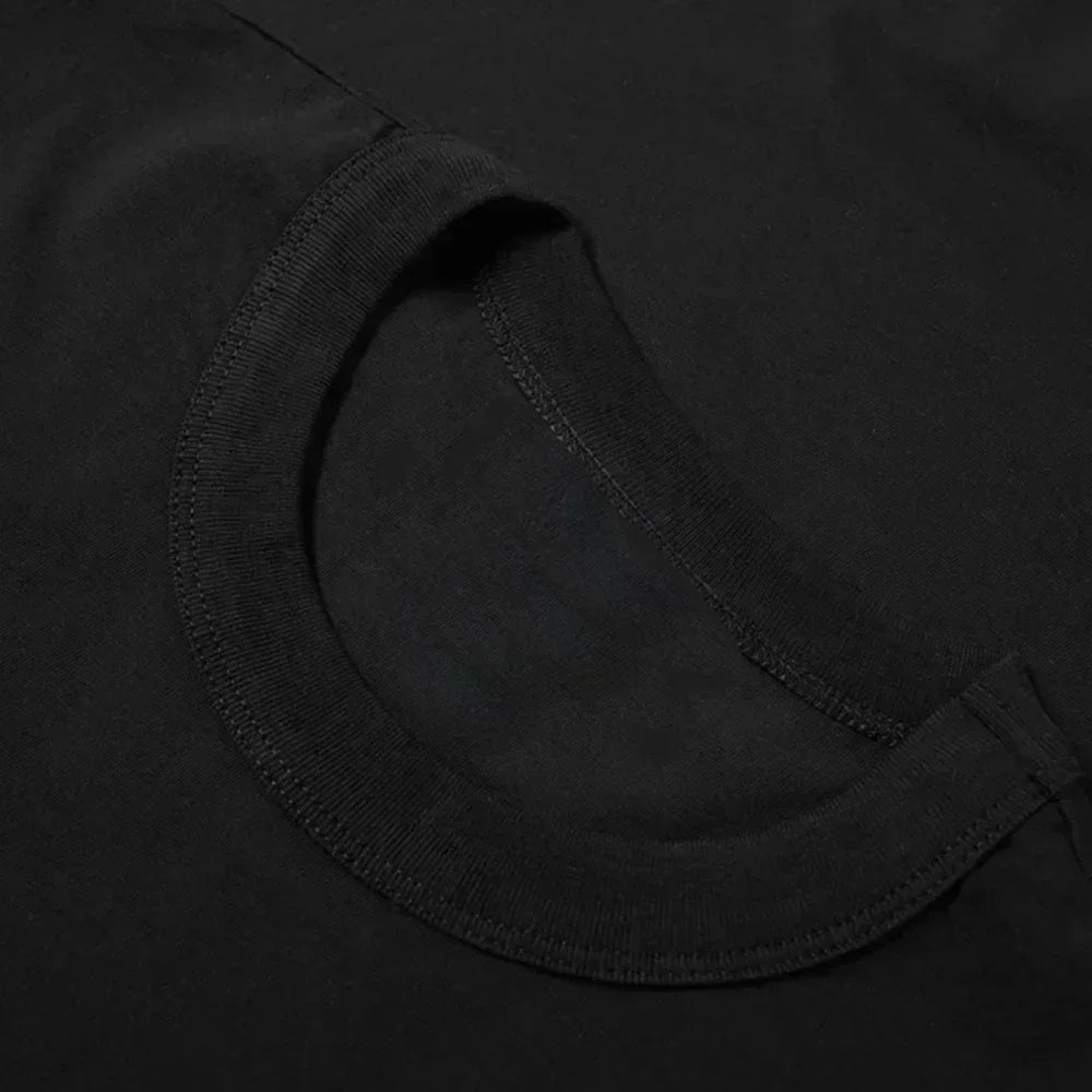 T-shirt oversize Y2K blu navy con ali d'angelo |   T-shirt con grafica sul retro e spalle scese, 100% cotone |   Top streetwear estivo dall'estetica grunge