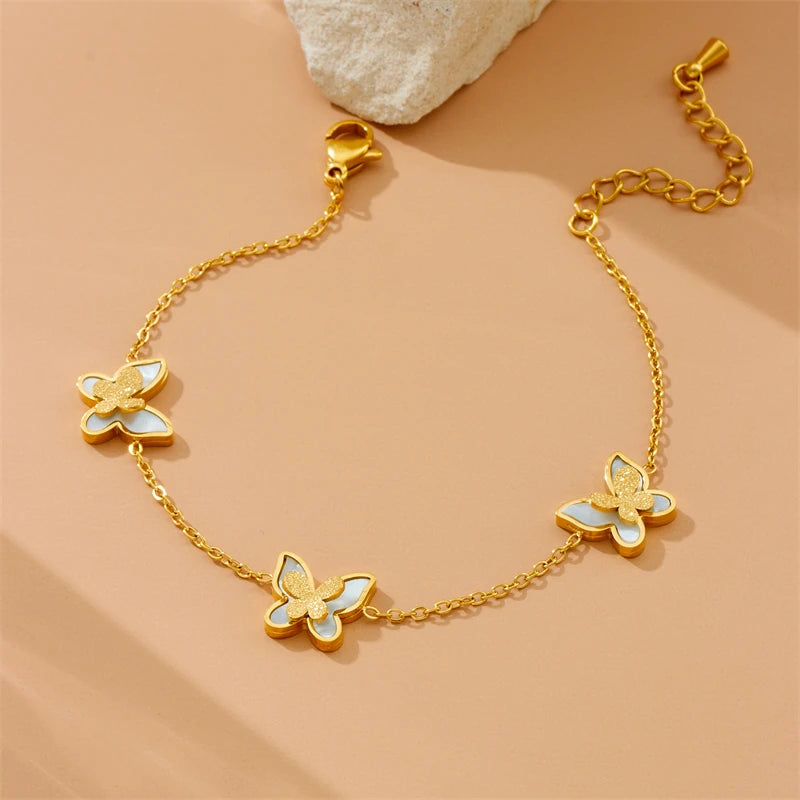 DIEYURO Acciaio inossidabile 316L dorato elegante conchiglia bianca serie farfalla set collana orecchini braccialetto gioielli di tendenza regalo