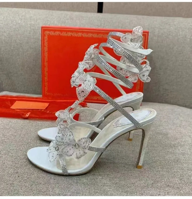 Strass di lusso Fiori Sandali gladiatore da donna Sexy Spago serpente Cinturino alla caviglia Tacchi alti Scarpe da ballo estive da sposa Sandali