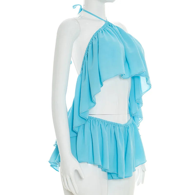Completo due pezzi Chaxiaoa da donna, estivo 2026, sexy, con top halter senza schienale e minigonna pantaloncino, per feste e serate in discoteca