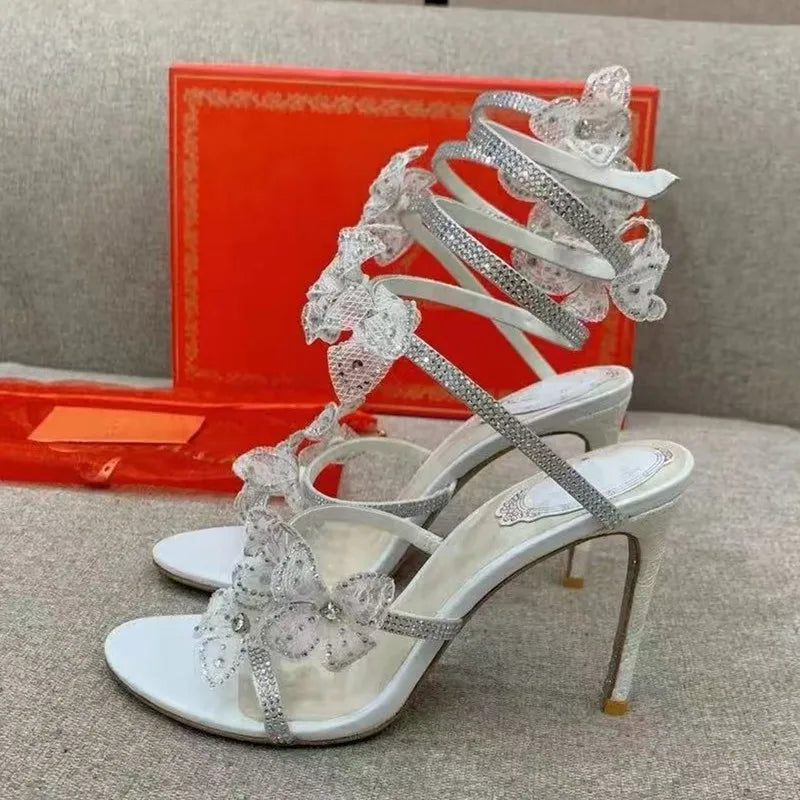 Strass di lusso Fiori Sandali gladiatore da donna Sexy Spago serpente Cinturino alla caviglia Tacchi alti Scarpe da ballo estive da sposa Sandali