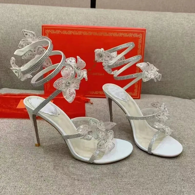 Strass di lusso Fiori Sandali gladiatore da donna Sexy Spago serpente Cinturino alla caviglia Tacchi alti Scarpe da ballo estive da sposa Sandali