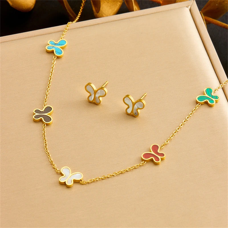 DIEYURO Acciaio inossidabile 316L dorato elegante conchiglia bianca serie farfalla set collana orecchini braccialetto gioielli di tendenza regalo