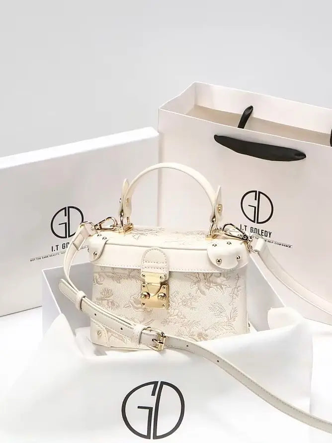 Mostra borsa elegante 2025 con motivo floreale in rilievo ideale per le feste serali da donna, anche una pratica tracolla per l'uso quotidiano